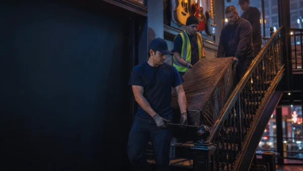 Flood Brothers crew at work: Move the Bar. Keep the Party on Schedule.