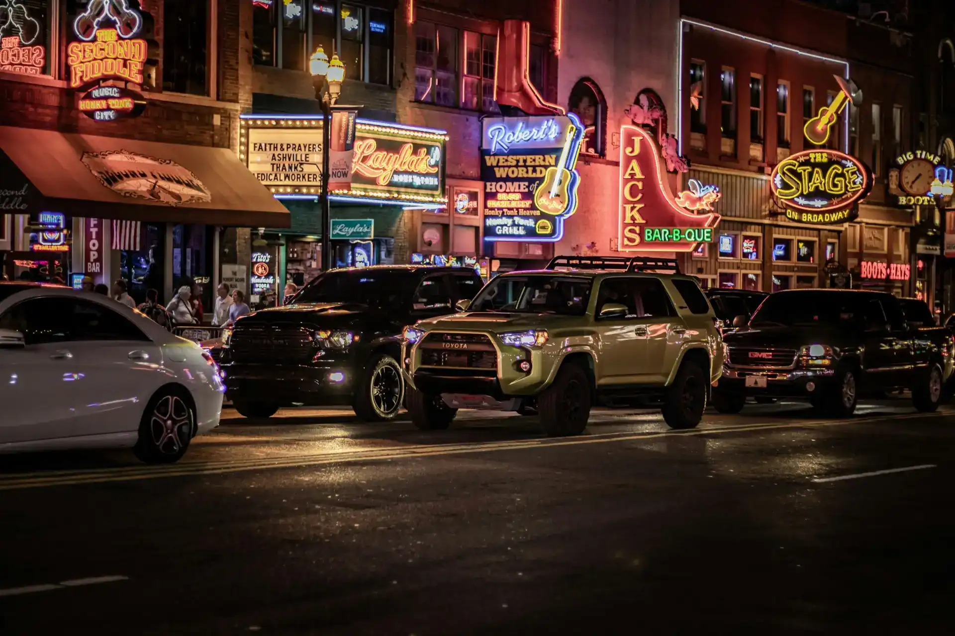 Nashville Lower Broadway lit up at night, the heart of live music touring